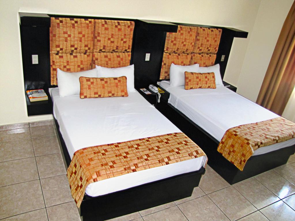 Hotel Tropico Inn San Miguel Ruang foto